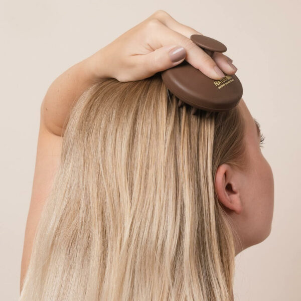 Natulique Stimulating Scalp Brush in Model's Dry Hair